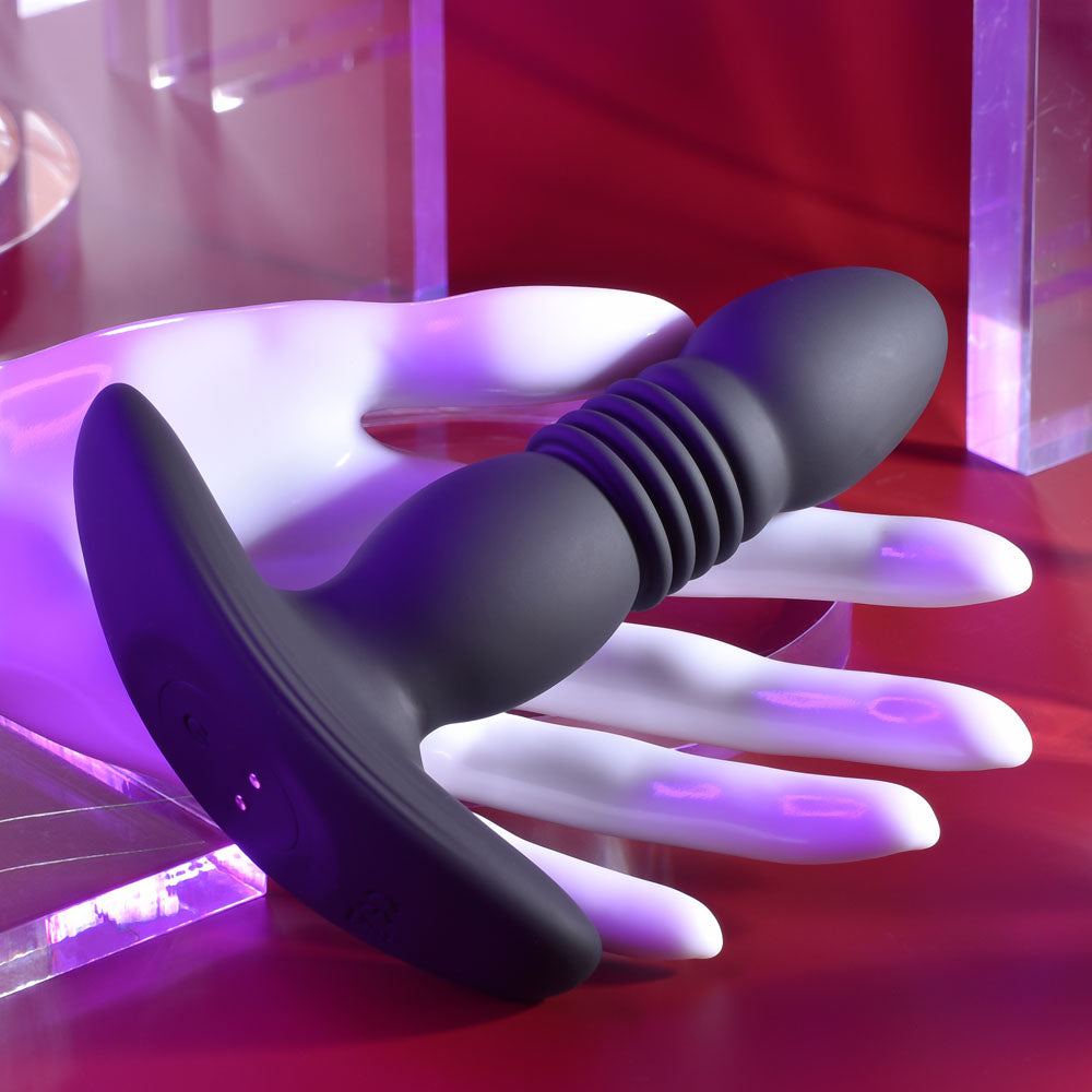 Playboy Pleasure TRUST THE THRUST - Black 13.7 cm USB Rechargeable Thrusting Butt Plug with Wireless Remote - PB-RS-2420-2